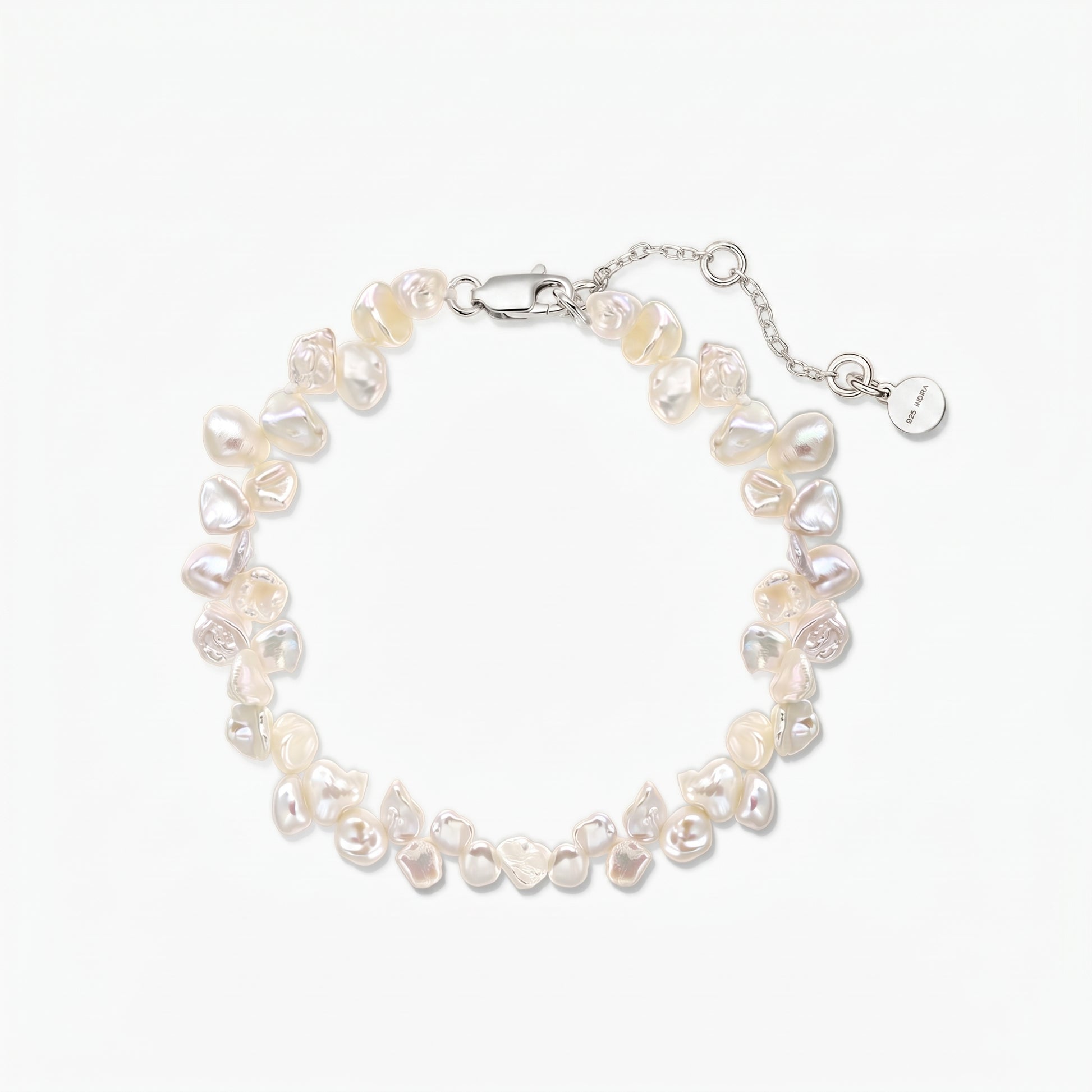 Adjustable keshi freshwater pearl bracelet with a rhodium‑plated 925 silver lobster clasp and extender chain on a white background.