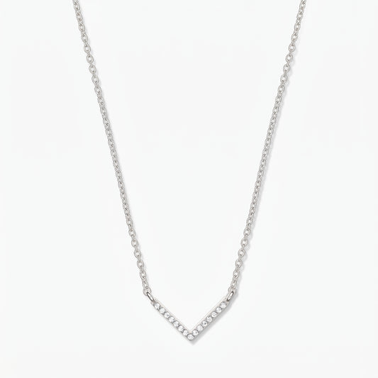 Silver V-shaped zirconia necklace with a delicate chain and pavé chevron pendant on a white background.