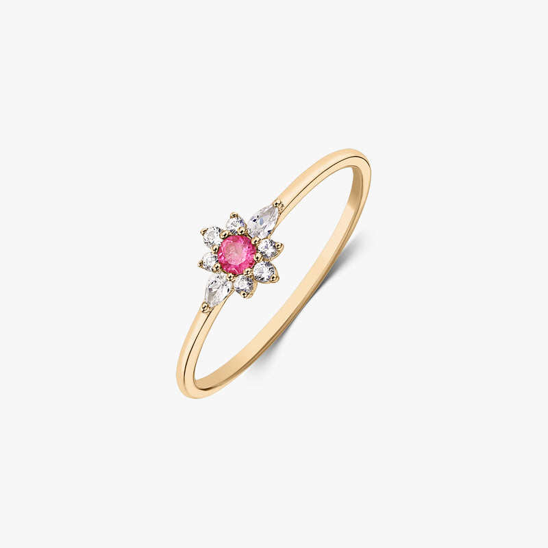14k yellow gold ring with a pink tourmaline center and a white sapphire floral halo on a white background.
