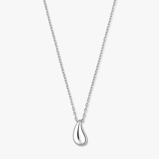 Silver teardrop pendant necklace on a fine chain, photographed on a white background.