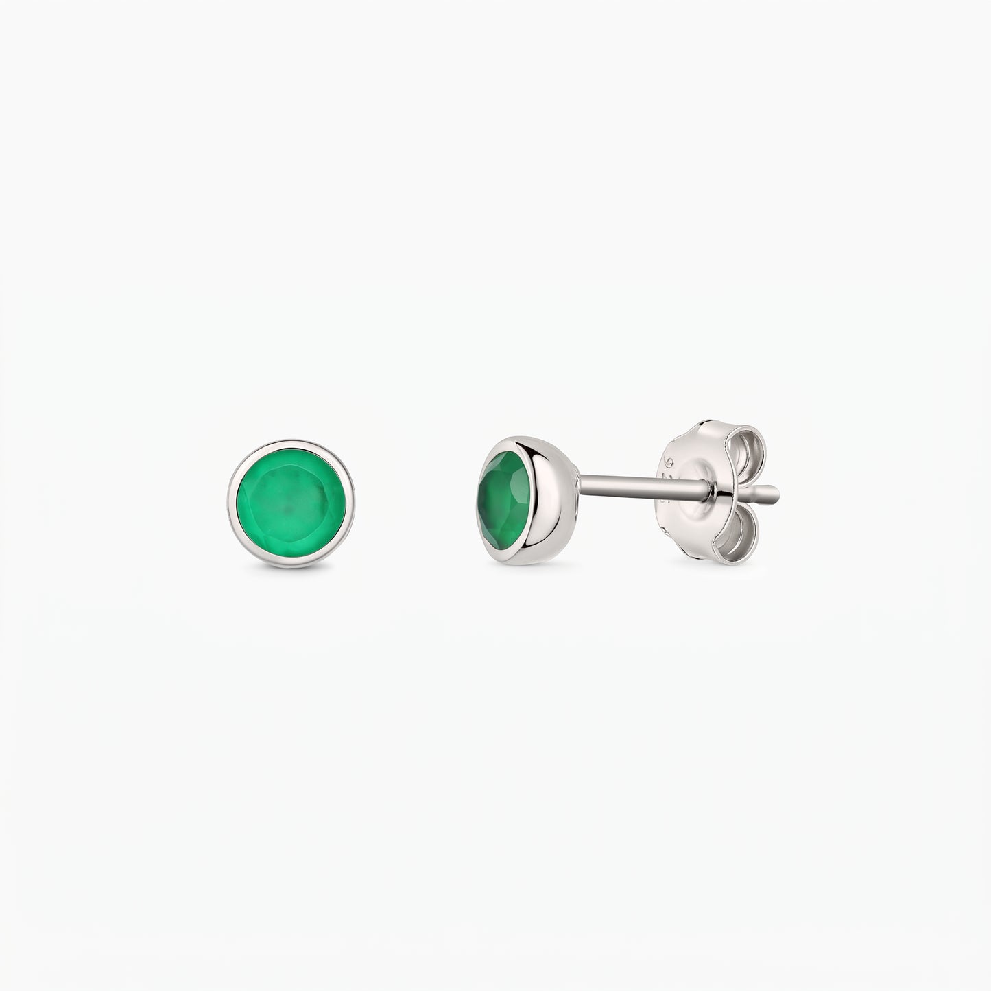 Pair of silver stud earrings with bezel‑set green onyx stones on a white background, shown front and side with butterfly backs.