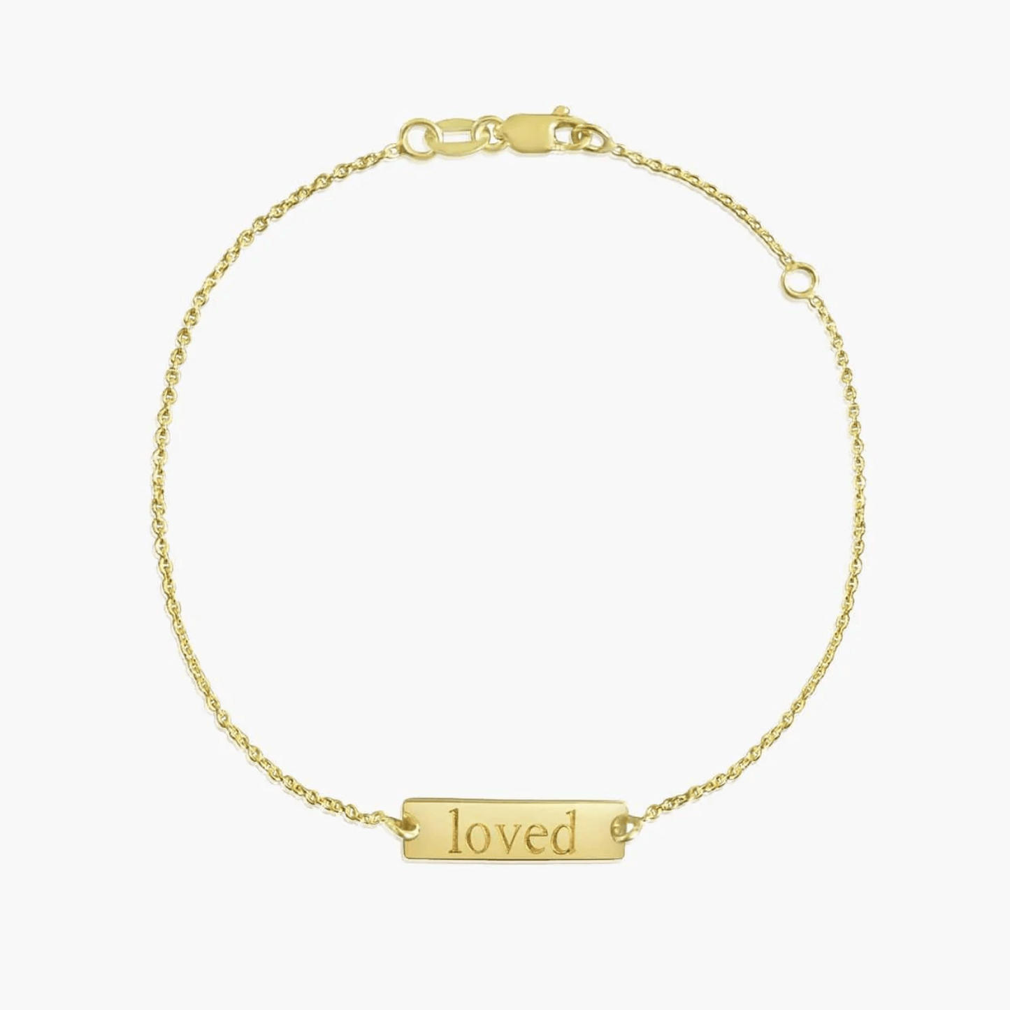 14K gold bracelet with a ‘loved’ inscription on a solid white background.