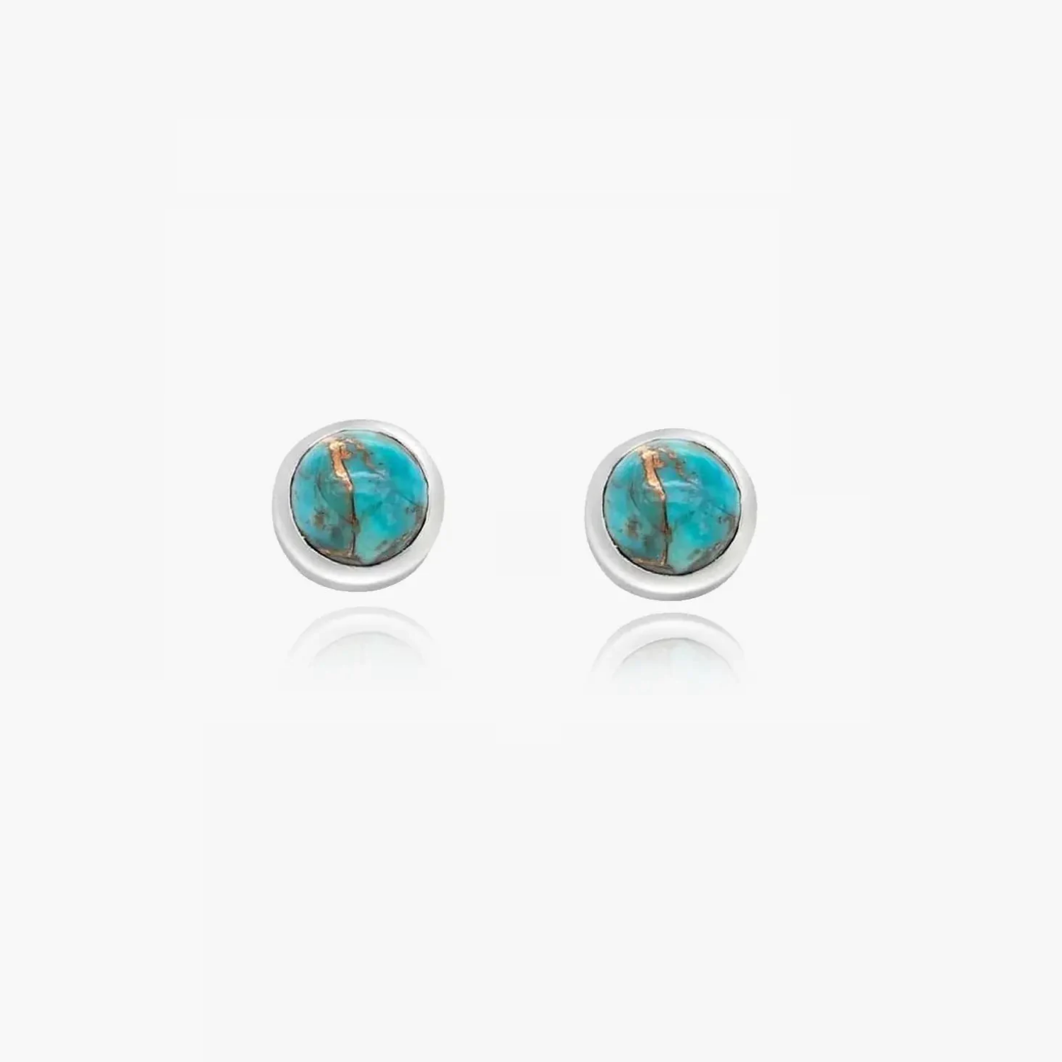 Silver stud earrings with turquoise stones on a white background.