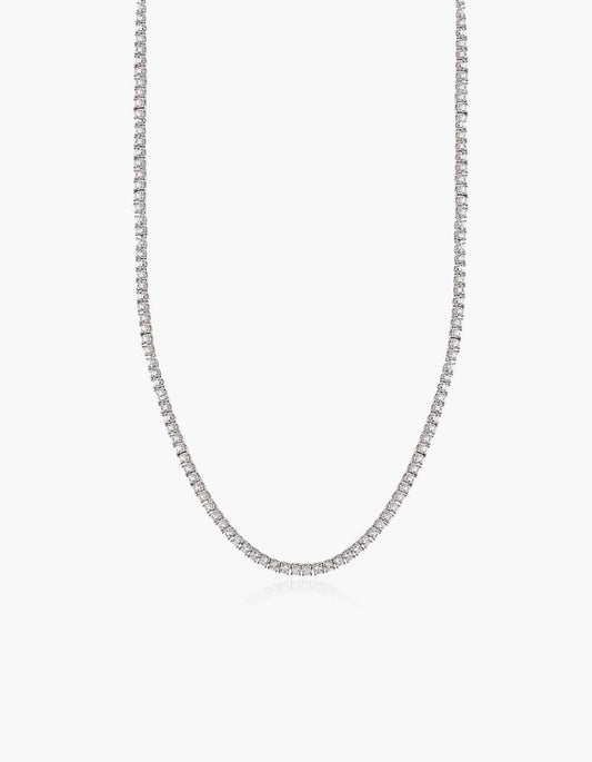 Silver tennis necklace with zirconia stones on a white background.