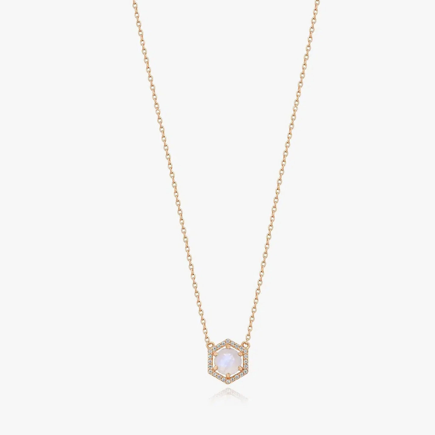 Rose silver necklace with moonstone pendant on a solid white background.